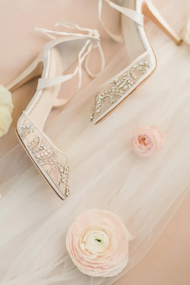 Beaded bridal shoes and florals from a Veni Vidi Amavi wedding